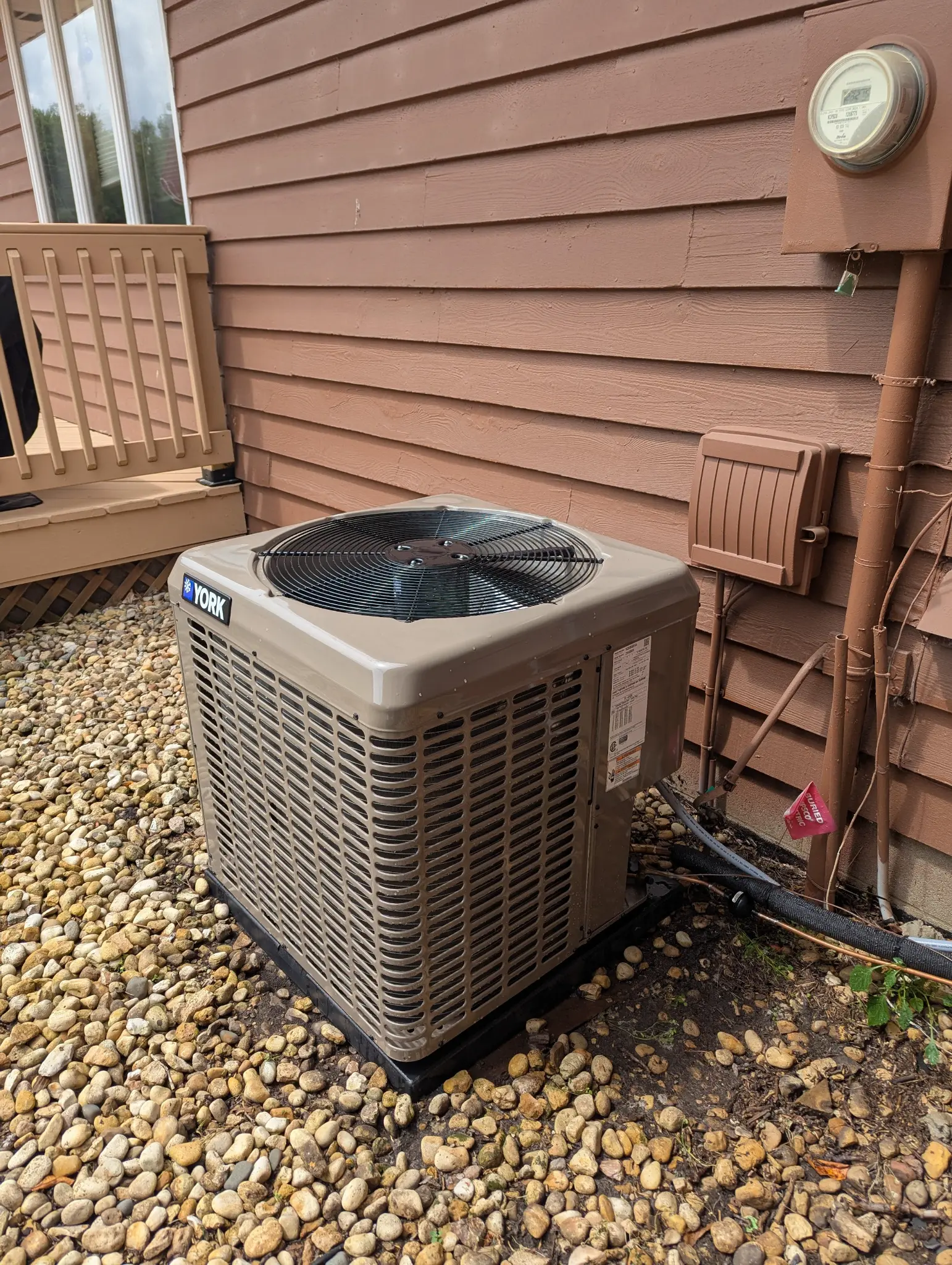 York outdoor air conditioning unit on a gravel base