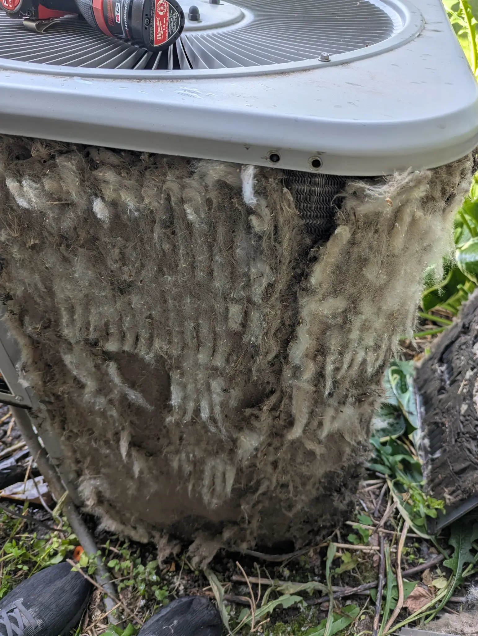 Close-up of outdoor equipment component with visible debris