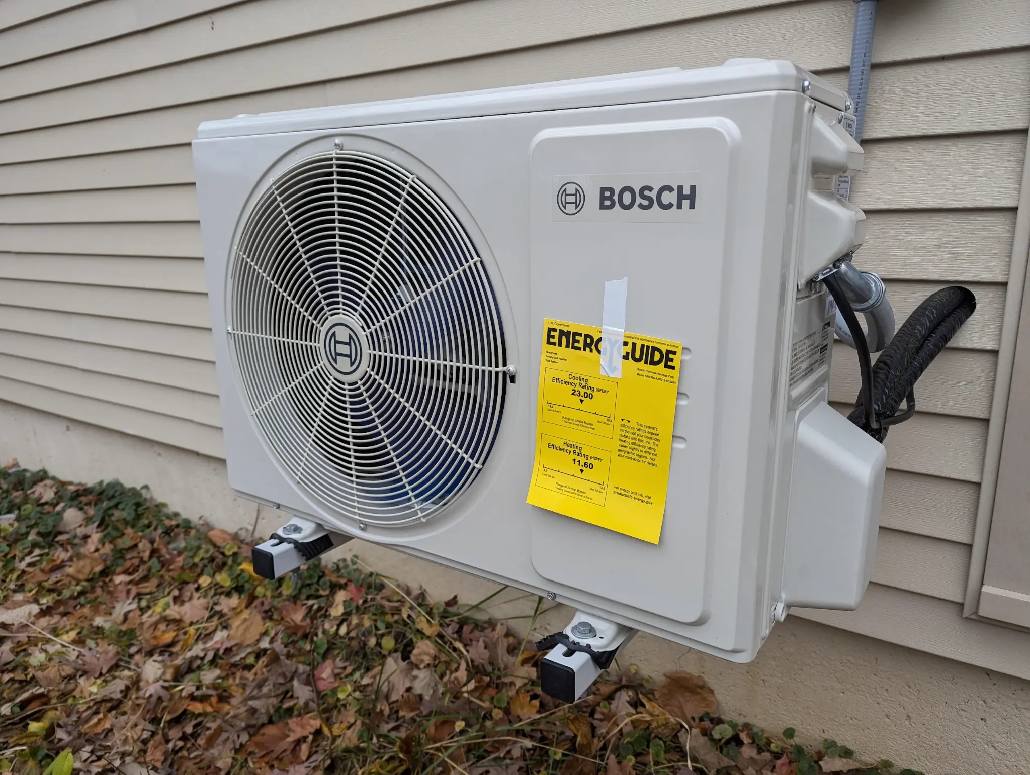 Bosch outdoor HVAC equipment with visible EnergyGuide label